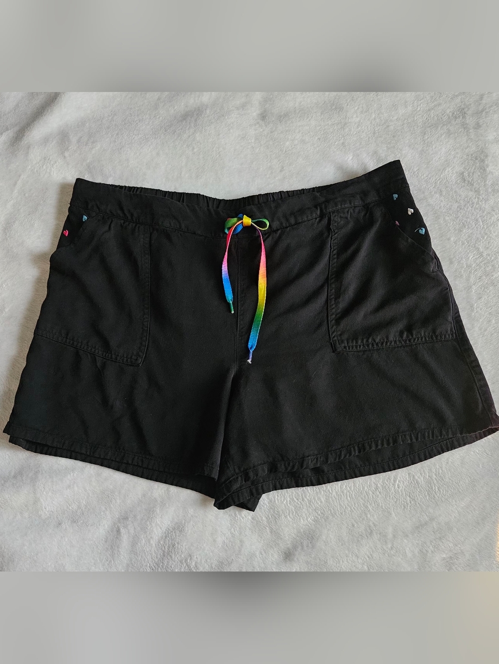 Feeling Proud pull on black shorts with rainbow details and pockets. Size: XXL